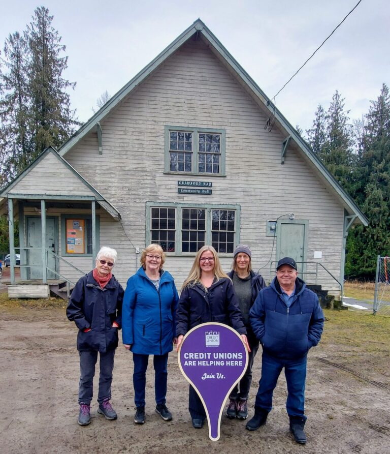 Local credit union makes a significant donation to the restoration of  the community hall in Crawford Bay